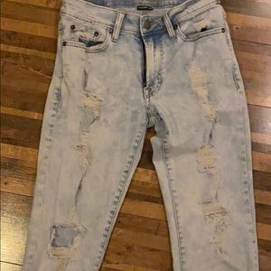 Stone washed American eagle jeans wripped